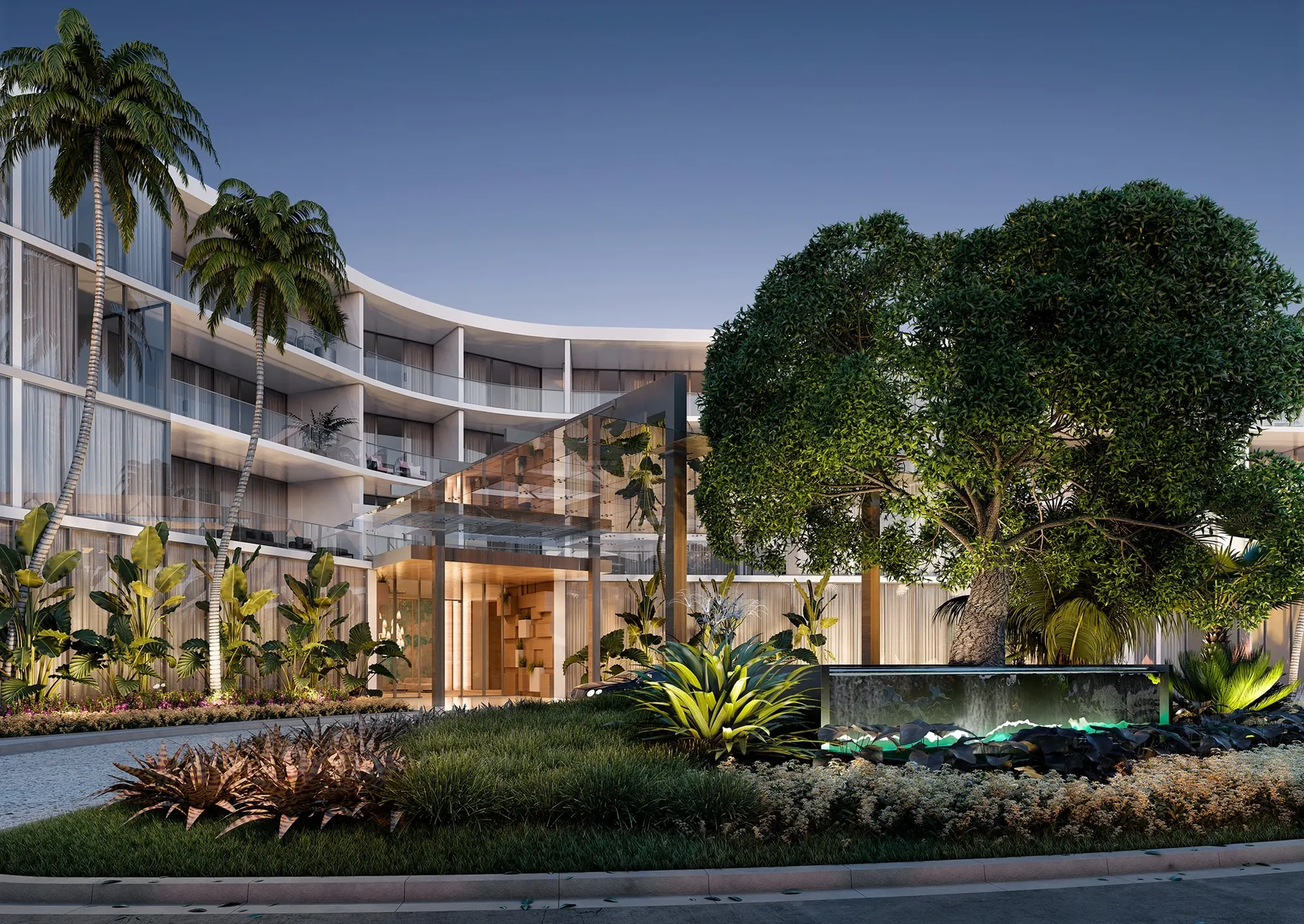 Rendering of the building's curved facade and landscaped driveway at dusk