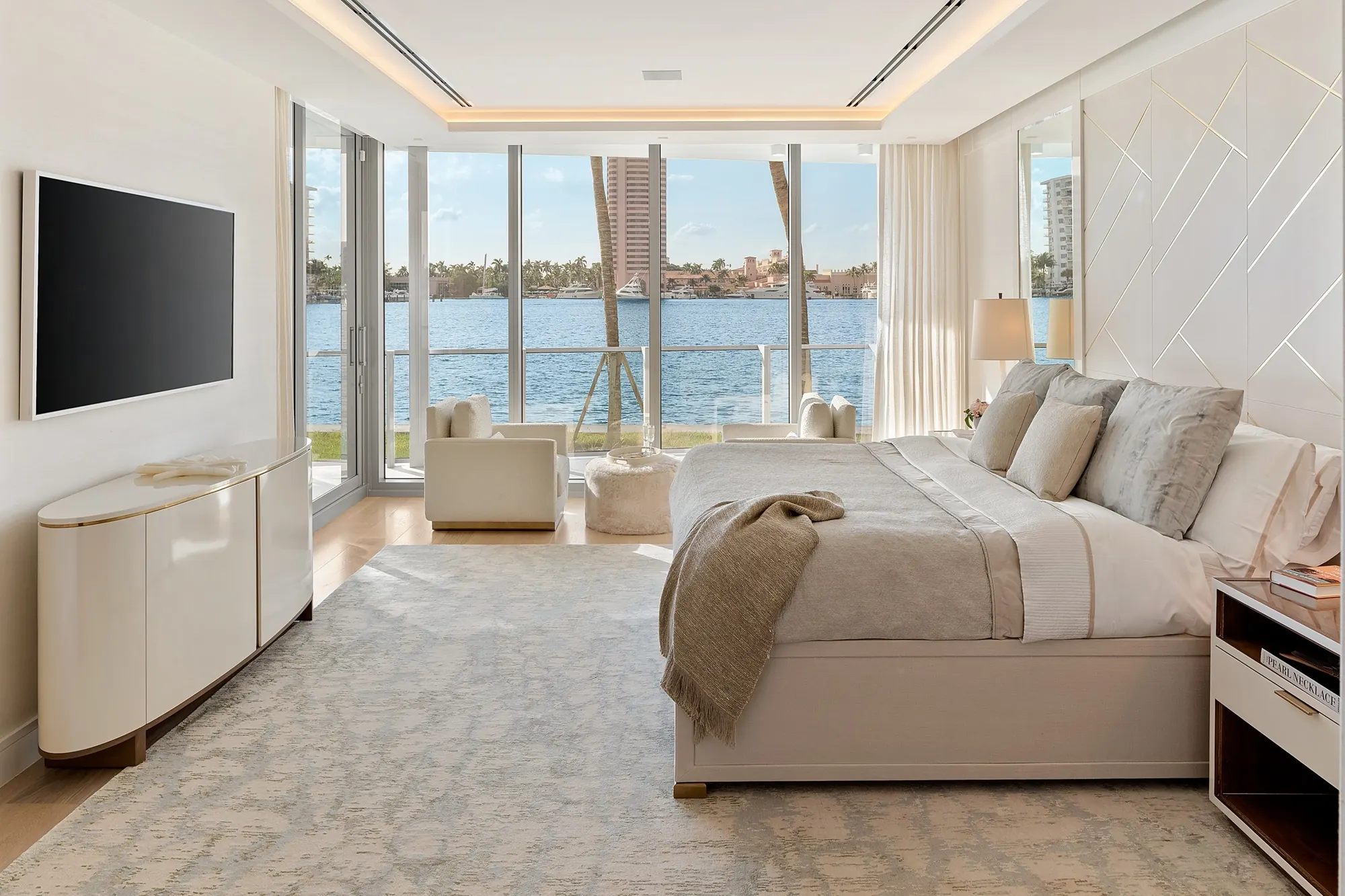 A lake-view bedroom at Boca Beach House