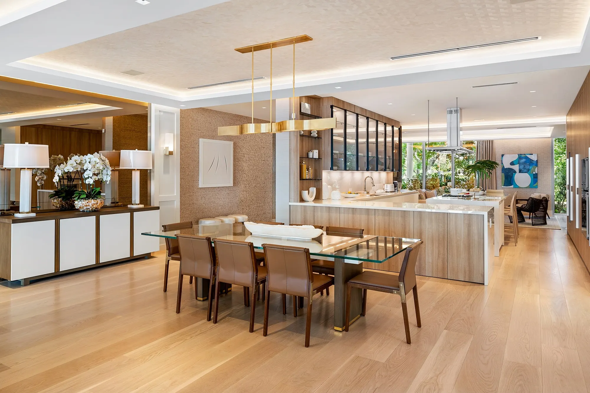 Kitchen and dining area with wood cabinetry and a long island