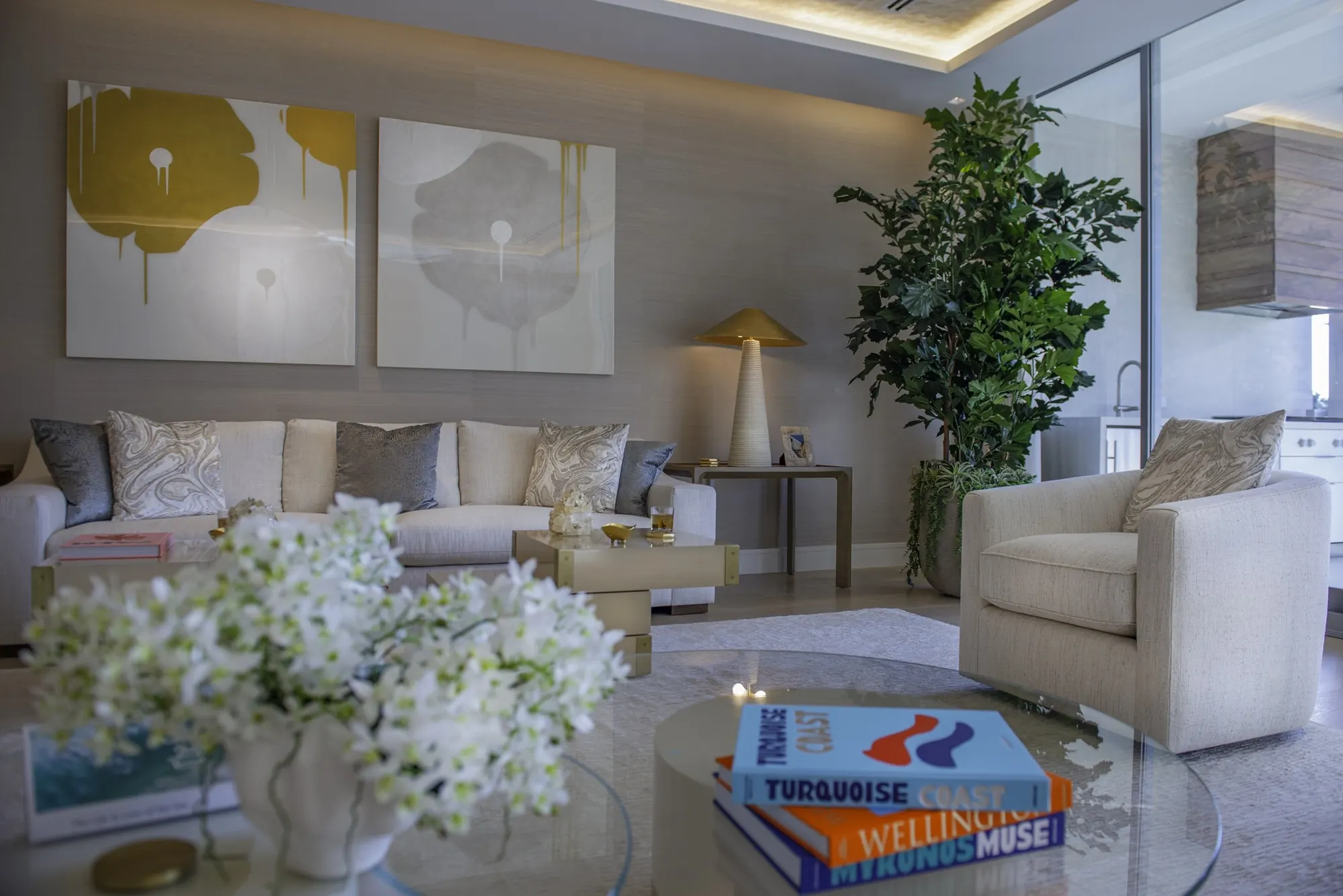 Living room seating with fresh flowers