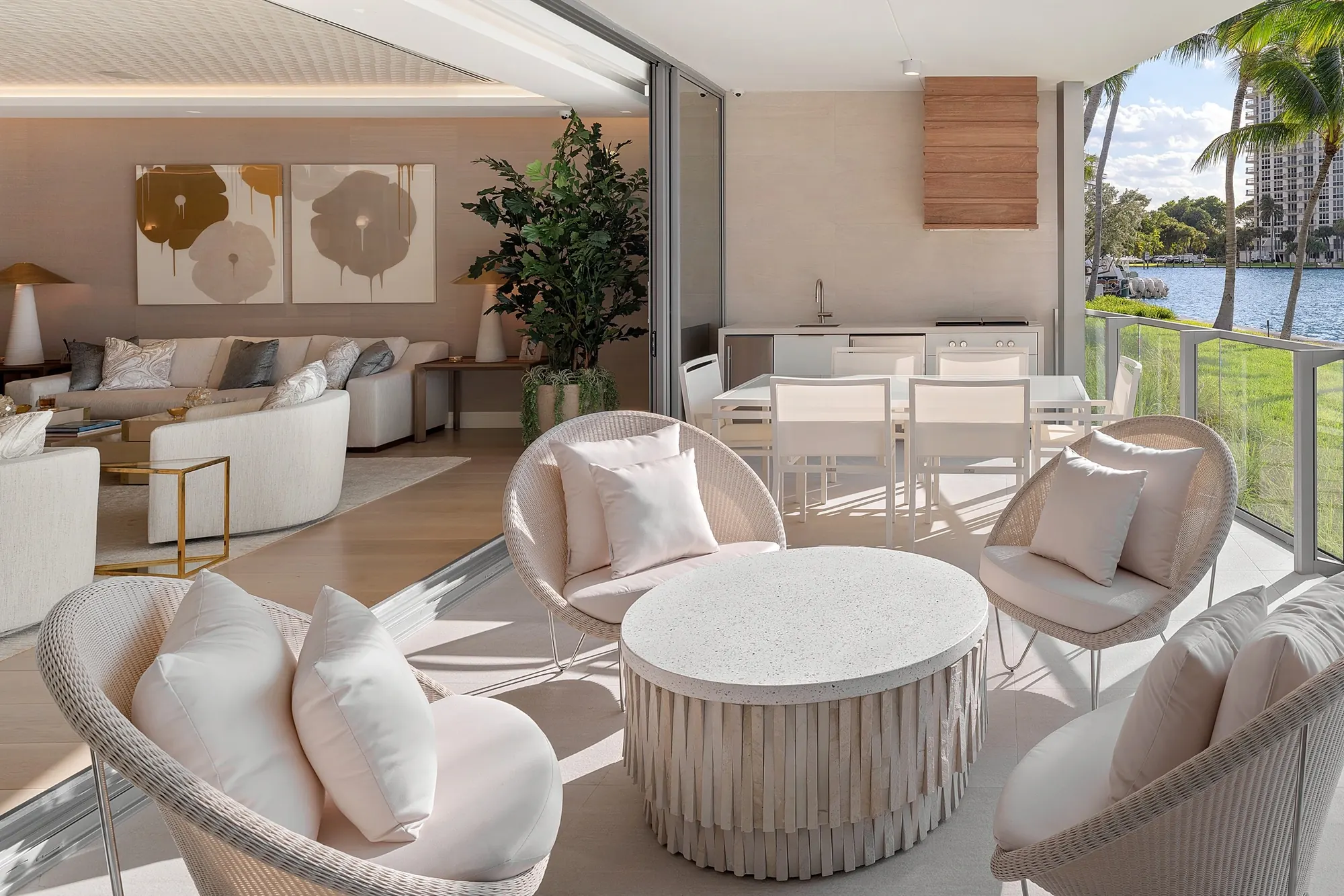 Terrace seating beside the living room, with a lake view