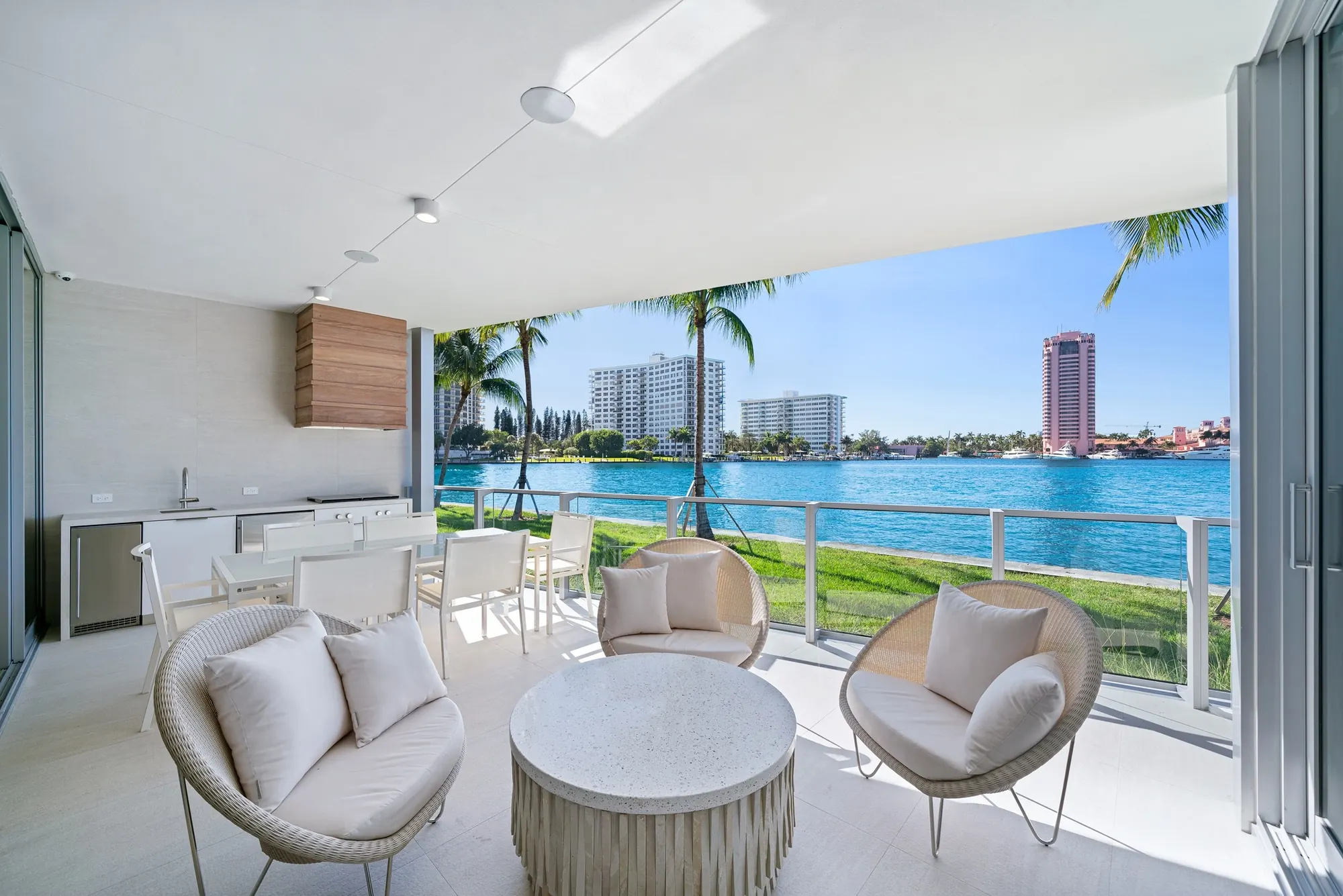 Lake-facing terrace with lounge seating